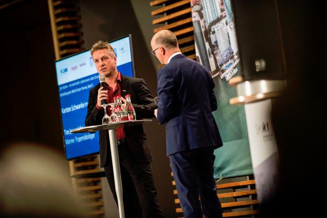 Tim Jennerjahn bei der Präsentation des WOC in Berlin. Foto: Jan Windszus