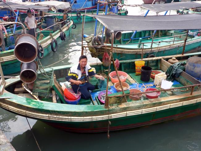 Fisher in Hainan, China