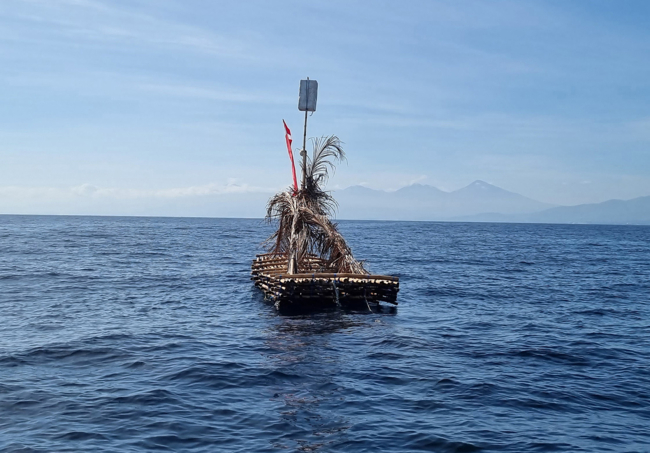 A raft made of bamboo that is used to attract fish.
